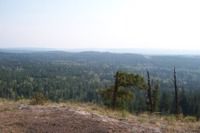 Looking out towards the Hills Health Ranch - 108 Mile - (haze is from forest fire in Washington) as we relax on a ride September 2006