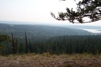 Looking out towards the Hills Health Ranch - 108 Mile - (haze is from forest fire in Washington) as we relax on a ride September 2006